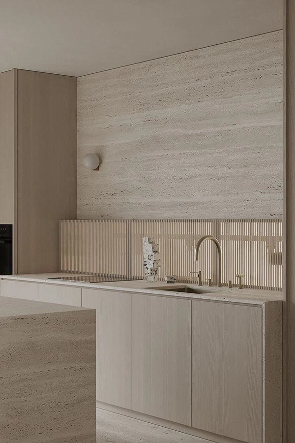 Travertine Kitchen with Brass Sconce