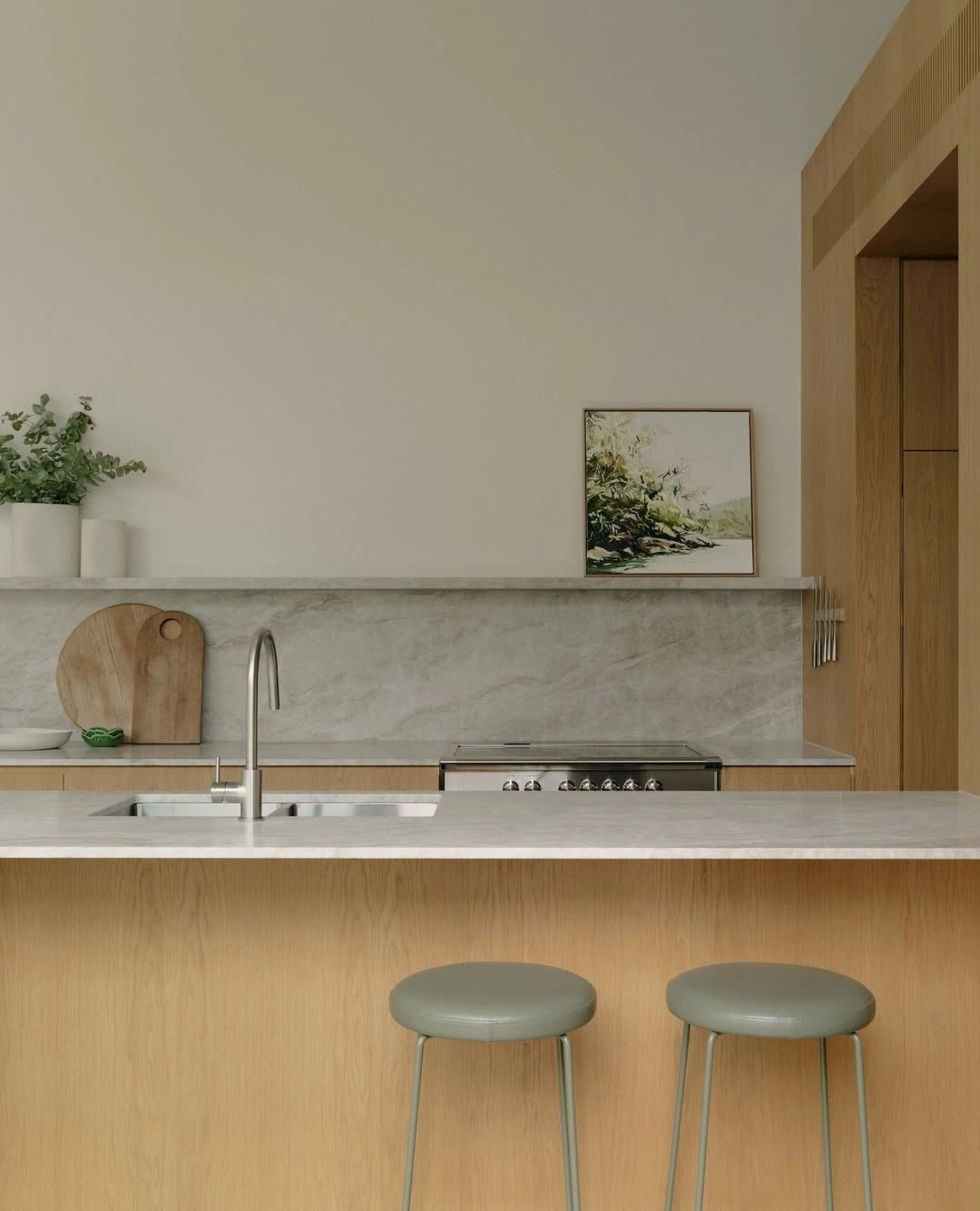 Marble Backsplash Kitchen with Framed Art
